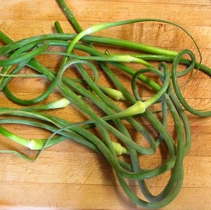 A surprisingly gentle green garlic flavor makes Garlic Scape Hummus a delightful spread for lunch or a party! Enjoy it during the short season for scapes!