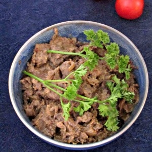 Layer eggplant and beef in a slow cooker, and add a little seasoning, for a super simple, delicious, and gluten free dinner! 