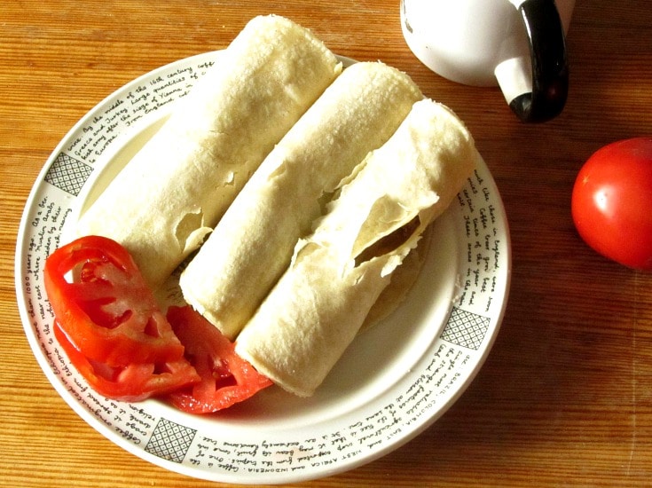 Corn tortillas, seasoned beans, and cheese all come together in Breakfast Bean Tacos, a quick and easy, gluten free breakfast!