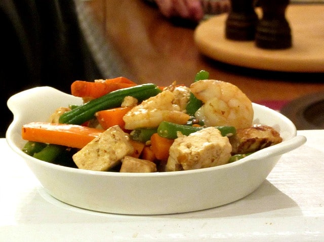 Saute shrimp and tofu with matchstick vegetables, then add just enough sauce to coat for a delicious, but simple, dinner.