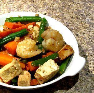 Saute shrimp and tofu with matchstick vegetables, then add just enough sauce to coat for a delicious, but simple, dinner.