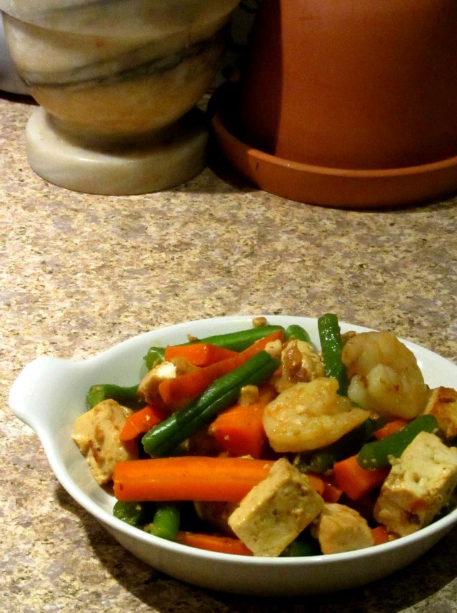 Saute shrimp and tofu with matchstick vegetables, then add just enough sauce to coat for a delicious, but simple, dinner.