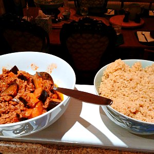 Eggplant simmered with beef, with quinoa