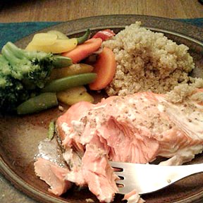 Roast salmon with mustard glaze, with mixed vegetables and quinoa