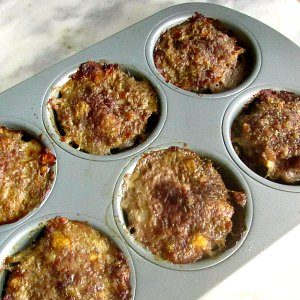 Sausage Meatloaf Muffins in muffin tin.
