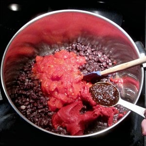 All ingredients for Spicy Black Bean Soup in soup pot