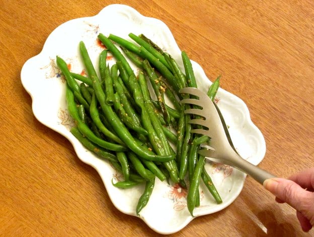 Improve less-than-fresh green beans - and dress up lovely truly fresh ones! - with this simple recipe for Garlic Green Beans. 