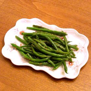 A plate with Garlic Green Beans.