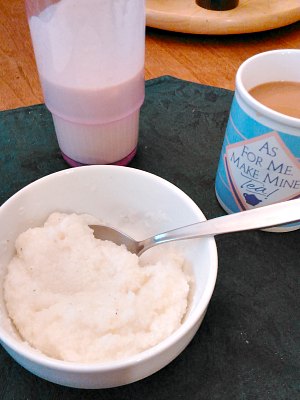 Breakfast - grits, protein shake, and coffee