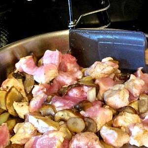 bite sized pieces of pork sauteed with mushrooms