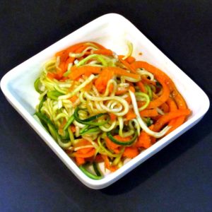 Cut long strands of vegetables with a spiralizer and toss them into a simple Spiralized Salad - tender-crisp, fresh, and easy to eat!