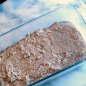 Banana bread batter in loaf pan