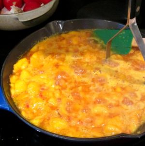 Cooking peaches being mashed