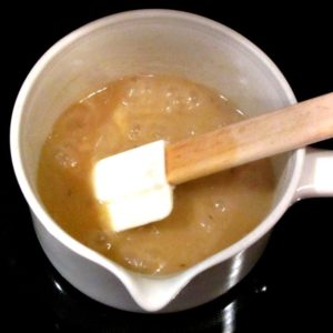 Stirring Instant Gluten Free Gravy to thicken