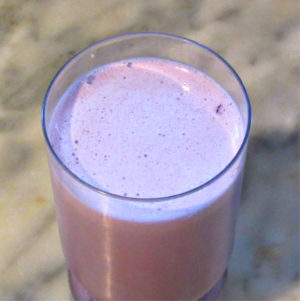 A glass of Berry Protein Smoothie