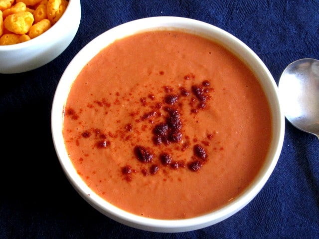 A bowl of Creamy High Protein Red Pepper Soup.