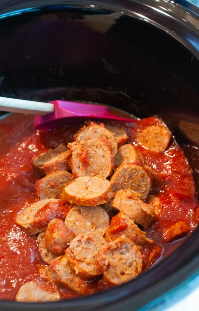 Sliced sausage returned to slow cooker